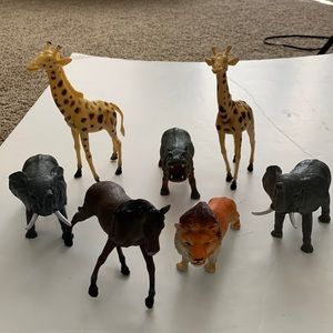 Plastic animal figurines a lot of seven
